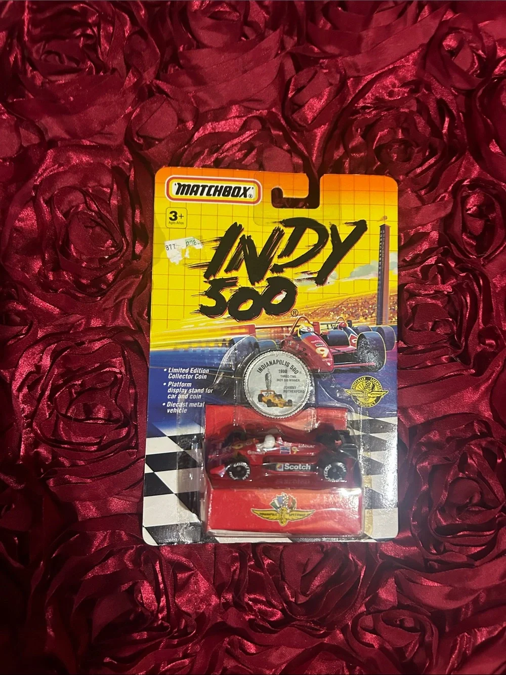 Matchbox Johnny Rutherford red Indy 500 Die-Cast Race Car with Collector Coin